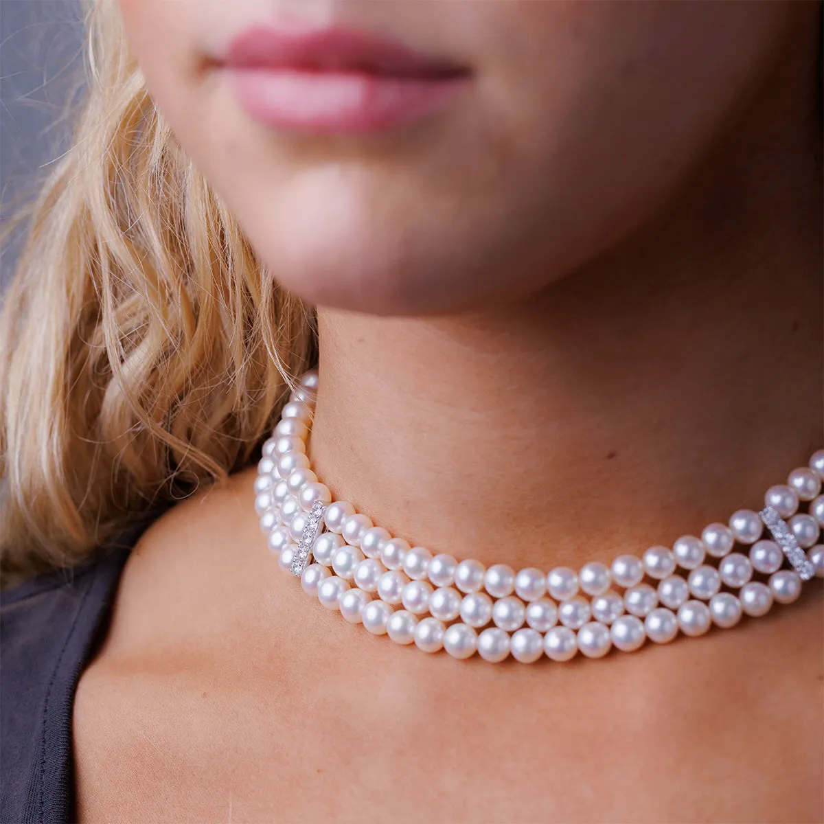 3 strand Pearl Necklace with White Gold and Diamond Spacer Bars.